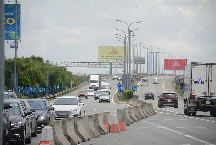 Cao tốc TPHCM - Long Thành - Dầu Giây thông thoáng  khi chính thức thu phí không dừng - Ảnh 2.