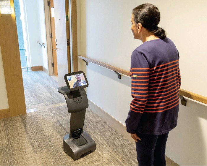 Robot dạy Yoga, chơi với người già - Ảnh 2.