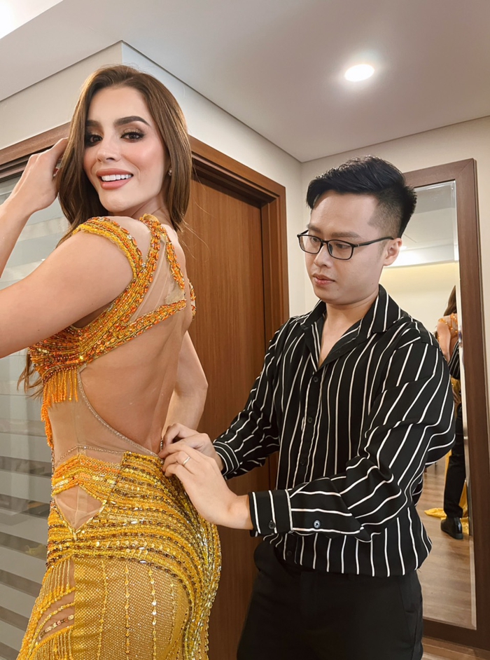 NTK Nguyễn Minh Tuấn dời show thời trang để thực hiện 50 chiếc váy cho Miss Grand 2023 - Ảnh 2.