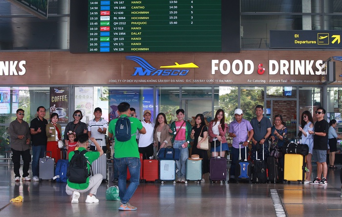 Sân bay Đà Nẵng nườm nượp du khách ngày đầu nghỉ lễ 2/9 - Ảnh 5.