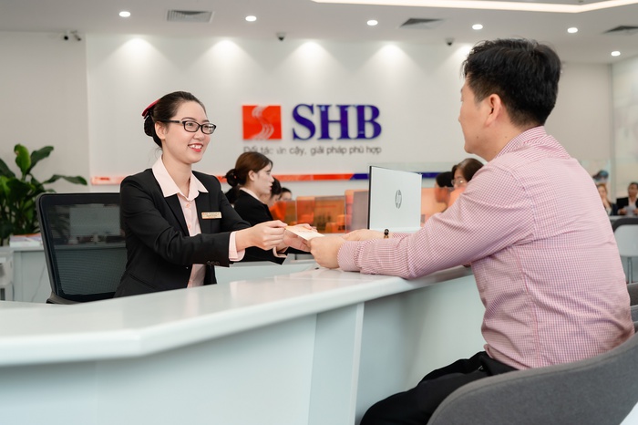 Ngân hàng SHB điều chỉnh mức phí SMS Banking- Ảnh 1.