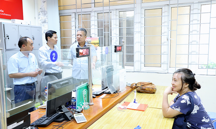Gỡ vướng việc thực hiện chính sách BHXH, BHYT ở cơ sở khi triển khai mô hình 2 cấp- Ảnh 2.