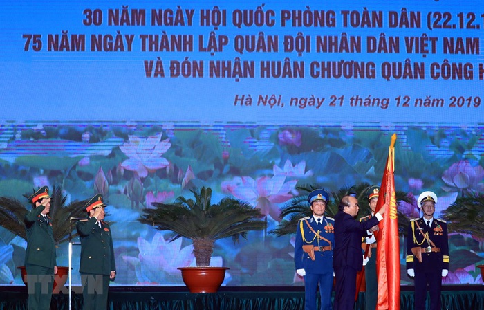 Bộ Quốc phòng kỷ niệm 75 năm Ngày thành lập Quân đội nhân dân Việt Nam - Ảnh 1.