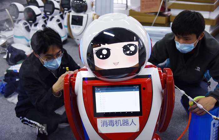 Trung Quốc triển khai robot thông minh 5G để phòng dịch COVID-19 - Ảnh 1.