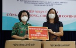 TPHCM: Tiếp nhận và trao tặng 10.000 bộ đồ bảo hộ y tế cấp độ 4 cho lực lượng tuyến đầu
