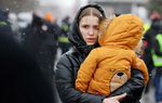 Tội phạm buôn người rình rập phụ nữ và trẻ em Ukraine