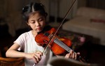 Nghiên cứu của giáo sư Mỹ: Trẻ em học nhạc giúp giảm lo lắng, cải thiện phát triển trí não 