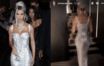 Kim Kardashian phải nhảy lên cầu thang vì bộ đầm bó sát 