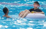 Người dân TP HCM rủ nhau đi công viên nước ngày mùng 2 Tết Quý Mão
