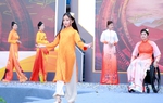 "Tô cam di sản" - Áo dài mang thông điệp phòng, chống bạo lực với phụ nữ và trẻ em