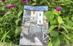 Cuốn sách được viết trong tù bằng những trang giấy tách đôi từ ấn phẩm Thế giới Phụ nữ