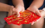 Tiền lì xì Tết: Người gửi ngân hàng, mua xe, người phân bổ theo công thức đặc biệt