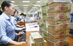 Làn sóng hạ lãi suất tiết kiệm của các ngân hàng 