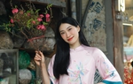 Nữ vận động viên bóng chuyền duyên dáng áo dài đón Tết