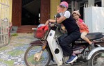 Mẹ đơn thân ngồi xe lăn truyền cảm hứng sống tích cực