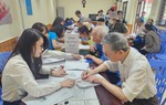 Hà Nội đề xuất chi gần 19 tỷ đồng hỗ trợ phí giao dịch khi chi trả an sinh xã hội
