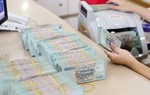 Ngành ngân hàng quý I/2026: Lợi nhuận tăng mạnh, nợ xấu lộ diện