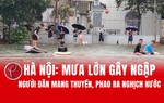 Hà Nội: Mưa lớn gây ngập, người dân mang thuyền, phao ra "nghịch" nước
