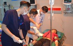 Tai nạn lao động, người phụ nữ bị đứt lìa cánh tay phải