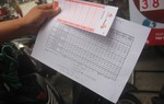 Xổ số tự chọn kiểu Mỹ được in sẵn đem bán dạo 