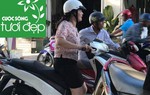 Hành động đẹp của người phụ nữ trẻ giữa trời nắng nóng