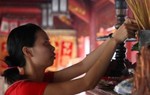 Con gái cũng có thể thờ cúng tổ tiên