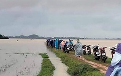 Đi thả lưới bắt cá cùng bố, con trai bị nước lũ cuốn