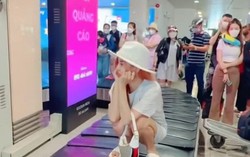 Cô gái ngồi trên băng chuyền hành lý có thể bị cấm bay