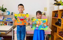 Em bé khéo tay vẽ lịch và tranh tặng ông bà ngày Tết