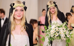 Elle Fanning tinh tế chọn hoa cúc làm điểm nhấn khi xuất hiện tại Met Gala 2023 