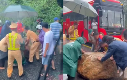 Xúc động hình ảnh chiến sĩ CSGT đèo Bảo Lộc cùng người dân lăn đá dọn đường trước lúc hy sinh