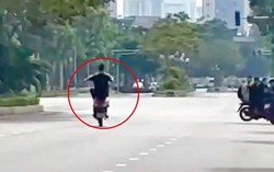 Con chạy xe máy "bốc đầu" trên phố, bố phải nộp phạt 9 triệu đồng