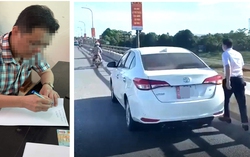 Dừng xe trên cầu đề thả đồ phóng sinh, người đàn ông bị phạt 13,5 triệu đồng