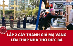 Lắp 2 cây thánh giá mạ vàng lên tháp Nhà thờ Đức Bà