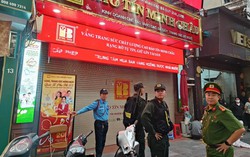 Hình ảnh Công an thu giữ tài liệu tại hệ thống Bảo Tín Minh Châu