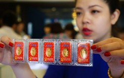 Vàng quay đầu giảm sau một ngày lên sát mốc kỉ lục