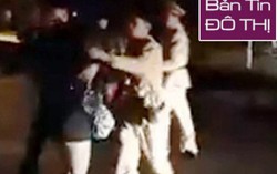 Bóp cổ công an để chồng giằng lấy xe máy vi phạm bỏ chạy