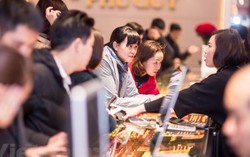 Giá vàng đồng loạt tăng, tỉ giá trung tâm thêm 20 đồng
