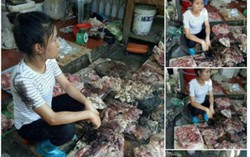 Chị bán hàng thẫn thờ nhìn phản thịt bị tưới dầu luyn giữa chợ