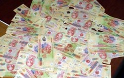 Bắt 2 cặp vợ chồng lưu hành tiền giả ở Yên Tử