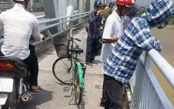 Bị mẹ mắng, cô gái đạp xe lên cầu Bến Thủy tự tử