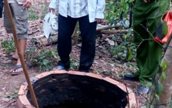 Một phụ nữ chết cháy bất thường dưới giếng hoang