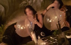 Hít bóng cười nguy hiểm với người dùng, sao không cấm?
