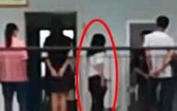 Trung Quốc: Không làm bài tập, nhóm học sinh phải xếp hàng để cô giáo đánh