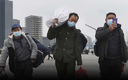 Trung Quốc: Lo ngại thắt chặt đi lại, người lao động nghỉ Tết sớm để về quê