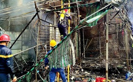 TPHCM: Giải cứu kịp thời người phụ nữ mắc kẹt trong đám cháy