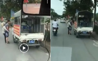 Hà Nội: Đi xe gắn chữ cảnh sát, mặc quần đùi, áo phông thu đồ của phụ nữ bán dạo