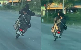 Xôn xao hai thanh niên đi xe máy bốc đầu, lạng lách trên Quốc lộ