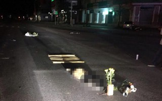 Một phụ nữ nghi bị sát hại nằm trên đường Quốc lộ