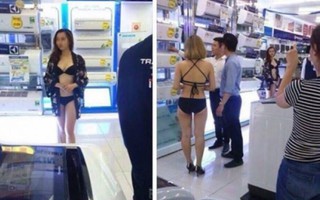 Mặc bikini đứng bán hàng tại siêu thị Trần Anh